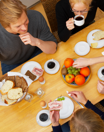 People eating a meal seen from above